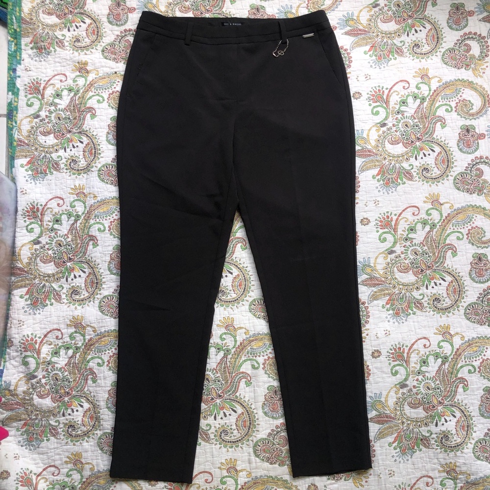 Black high-waisted straight-leg trousers with zipper and button closure